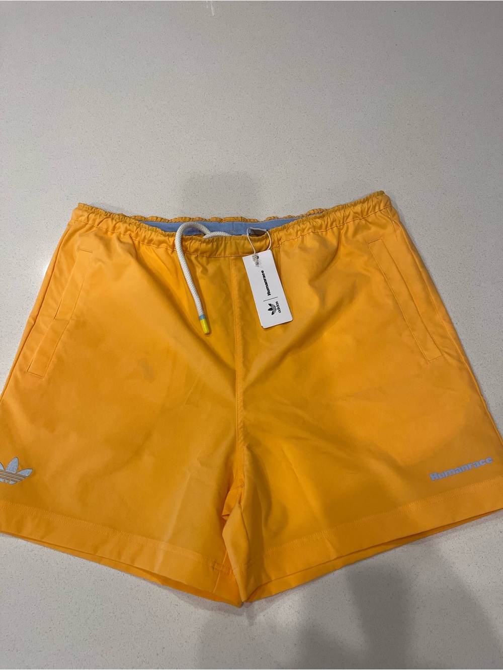 Adidas humanrace Men’s Orange Swim Shorts